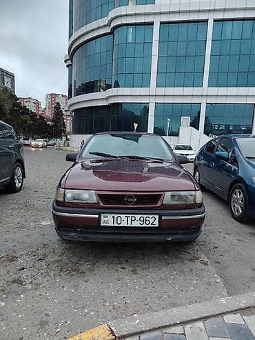vaz 2107 paxlava salon: Opel Vectra sedan - Korpus: 4 qapılı sedan, tünd bordo rəng - Nömrə — 1