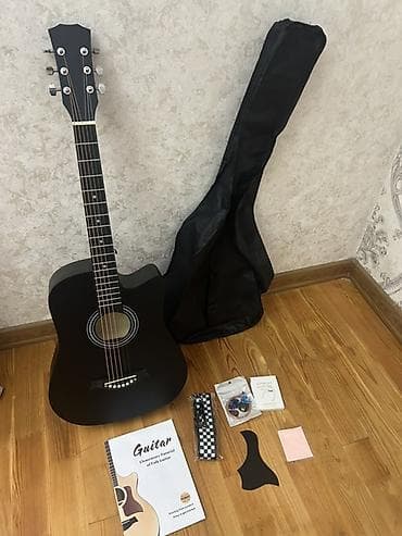 gitara satilir: Salam akustik gitara 1 aydı almışam pul lazımdı istifadə etmirəm deyə — 1