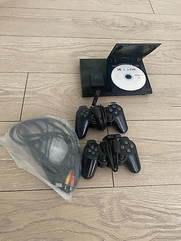 ps1 disk: Sony PlayStation 2 Slim (PS2) oyun konsolu seti Xüsusiyyətlər: - — 1