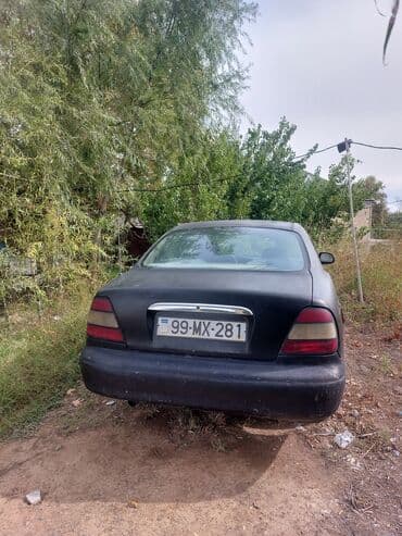 mersedes disk teker: Daewoo Leganza: 2 l | 1998 il Sedan — 2