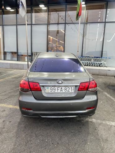 kia seed 2014: Boz rəngdə olan bu avtomobil rahat idarəetmə və funksionallıq təklif — 9