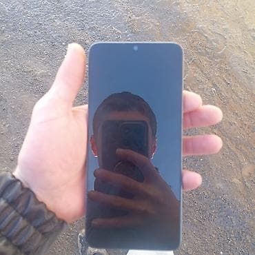 cat ekran: Məhsul: Redmi smartfon Xüsusiyyətlər: - Korpus: mavi rəngli arxa — 2