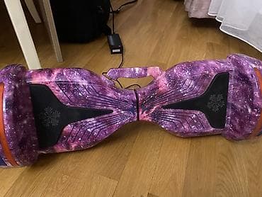 Elektrik hoverboard – qalaktika temalı bənövşəyi dizayn 1 ildir lalafo.az -da Elektrik hoverboard – qalaktika temalı bənövşəyi dizayn 1 ildir