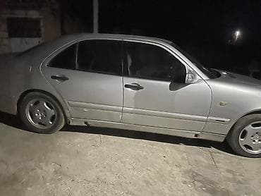 volkswagen tiguan ii: Mercedes-Benz E-Class: 2.2 л | 1997 г. Седан — 3