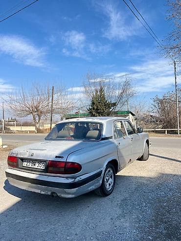 opel zafira a: QAZ 31105 Volga: 2.3 l | 2004 il 350350 km Sedan — 4