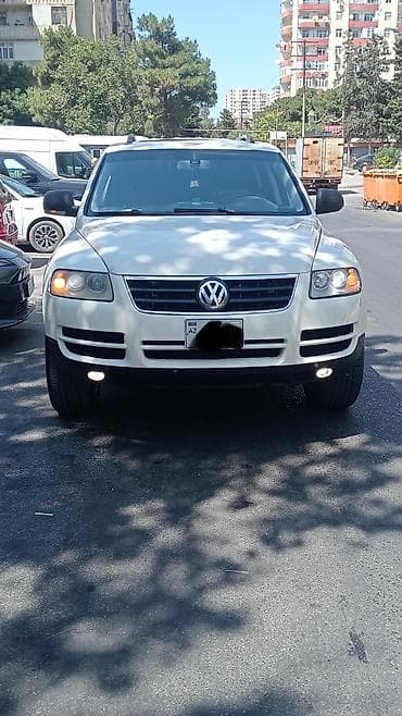 Touareg 3.2 mator 2004 cu il maşın baxılmış maşındır özünə yaxşı