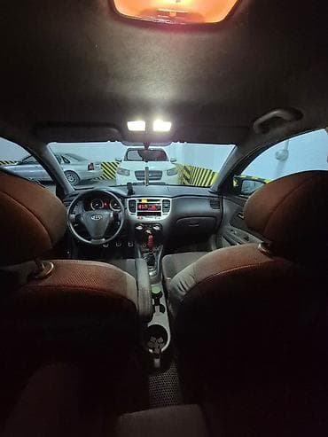 avtomobillər: Kia Rio: 1.5 l | 2007 il Hetçbek — 5