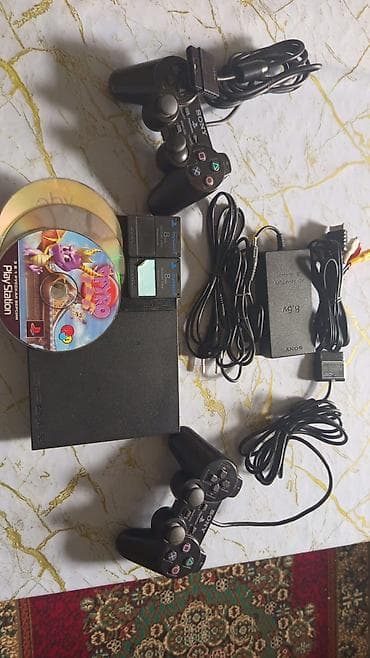 PlayStation 2 Slim oyun konsolu dəsti.Az istifadə olunub üstündə — 1