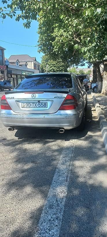audi a5: Mercedes-Benz E 240: 2.6 l | 2002 il Sedan — 6