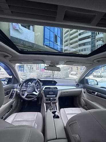 mercedes e280: Mercedes-Benz C‑Class sedan (W204) – qara rəng, AMG paketli görünüş — 7