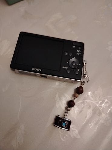 nokia dual sim: Məhsul: Sony Cyber-shot rəqəmsal fotoaparat - Gümüşü korpus, arxa — 2