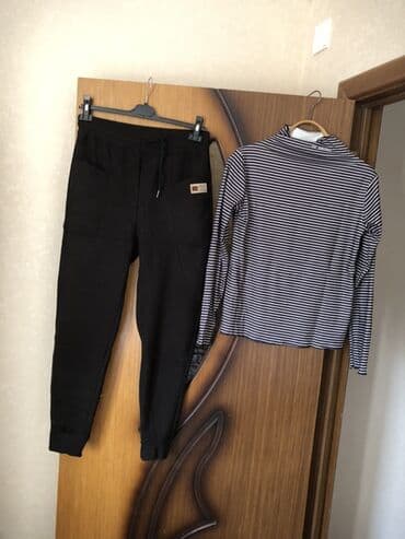 i̇dman formaları i̇dman kostyumları: İdman dəsti – şalvar və kofta - Şalvar: qara rəngdə, jogger kəsimi; — 1