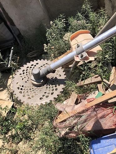 daşlar: Benzinlə işləyən otbiçən/trimmer - Güclü benzin mühərriki, arxaya — 2