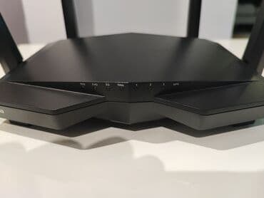 komputer cantasi: Tenda A6C iki diapazonlu Wi‑Fi router. 10 metr kabel hədiyyə — 4