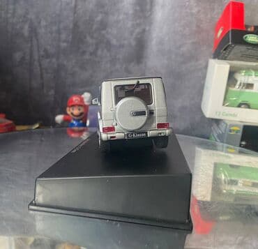 metbex tavan modelleri: Коллекционная модель Mercedes-Benz G-class W463 silver 2012 AutoArt — 19