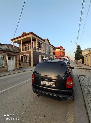 запчасти форд фокус 1: Opel Zafira A, qara rəng, 7 yerlik miniven. Xüsusiyyətlər: - Geniş — 4