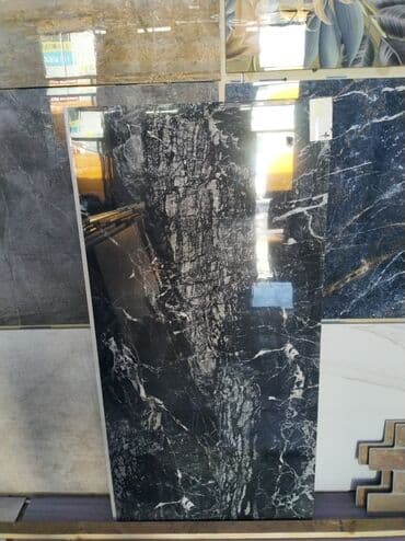 metbex mebel arasi kafel: Qara mərmər effektli, cilalanmış səthli keramik plitələr. Bu plitələr — 1