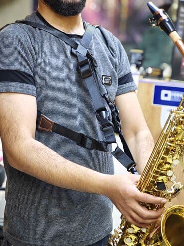 Tar: Saksafon boyun kəməri Bu kəmər alətin ağırlığını daşımaq və ifa zamanı — 2