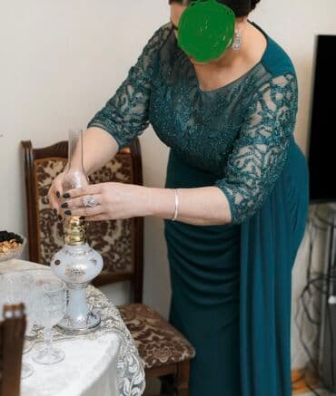 ərəb qızılının qiyməti 2024: 50 razmer Toy paltari. 1 defe geyinilib. Uzerindeki olchu 50 — 2