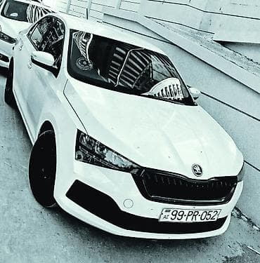 Skoda: Skoda Scala, ağ rəng, sedana yaxın hetçbek kuzov. Dinamik və iqtisadi — 2