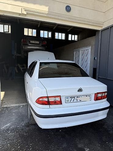07 kuzası: Model: Iran Khodro Samand (ağ sedan) Xüsusiyyətlər: - Kuzov: 4 qapılı — 1