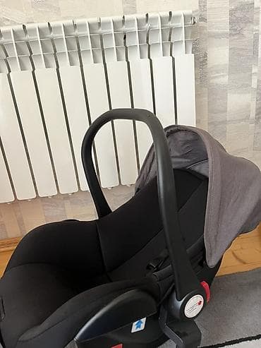 Uşaq avtomobil oturacağı (beşik tipli). - Yenidoğandan təxminən 13 — 1