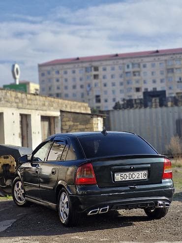 disqi teker satisi: Model: Opel Astra G sedan Kuzov: 4 qapı, tünd yaşıl rəng Mühərrik və — 8