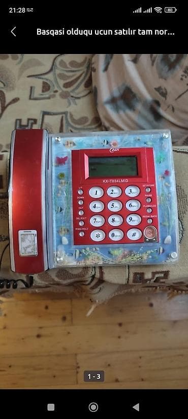 Stasionar telefon Simli