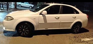 xezer avtomobil satis merkezi: Sedan avtomobil – ağ rəng Model:tipli 4 qapılı sedan Kuzov: ağ rəng — 3