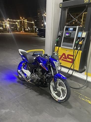Motosiklet – Naked tip, mavi/qara rəng sxemi, ağ disklər Texniki və lalafo.az -da Motosiklet – Naked tip, mavi/qara rəng sxemi, ağ disklər Texniki və