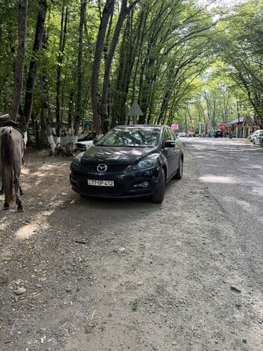 купить чехлы на авто: Mazda CX-7: 2.3 л | 2009 г. Кроссовер — 8