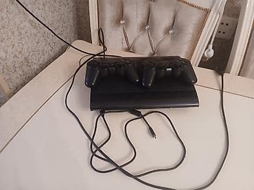 прокат playstation 3: Sony PlayStation 3 Super Slim oyun konsolu - Rəng: qara - Korpusa — 1