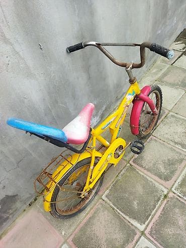 velosiped satilir ucuz: Uşaq velosipedi – kiçik ölçülü, 16 düyümə yaxın təkərlər - Rəng: sarı — 2