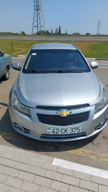 ucuz masnar: Chevrolet Cruze sedan – gümüşü rəng. - Kuzov: 4 qapılı sedan, iri — 1