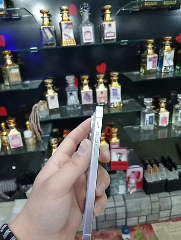 iphon 15: Məhsul: Ağıllı telefon (ağ rəng), üçlü arxa kamera modulu və LED flaş — 2