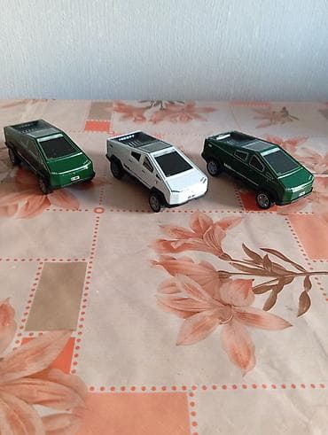 depozitli masinlar: Ilon Maskin balaca plastmasli pikap avtomobil modelləri (elektrik — 1