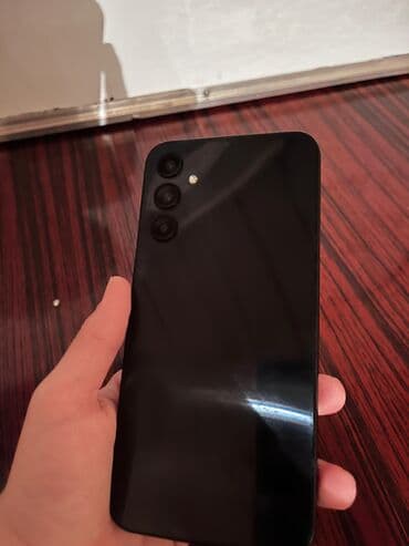 Мобильные телефоны: Smartfon – 128 GB yaddaş / 6 GB RAM - Kamera: 12 MP əsas kamera — 6