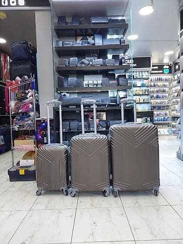 Çamadanlar: Sərt gövdəli çamadan dəsti – 3 ədəd - Material: zərbəyə davamlı sərt — 1