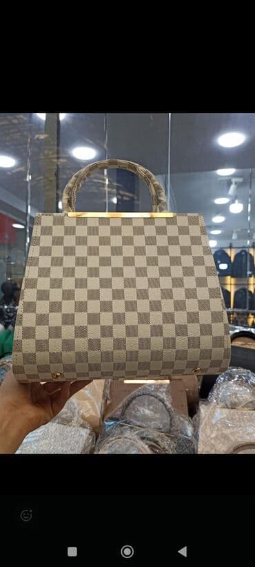 kurtka qadin ucun: Əl çantası — 17