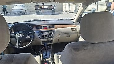 ford focus hatchback: Mitsubishi Lancer: 1.6 l | 2006 il 466000 km Sedan — 9