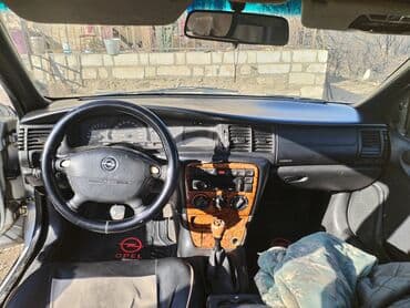 Tavalar: Opel Vectra: 1.6 l | 1998 il 357433 km Sedan — 9