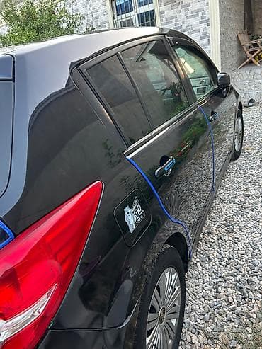 arceo disk: Nissan Tiida: 1.5 l | 2011 il Hetçbek — 5