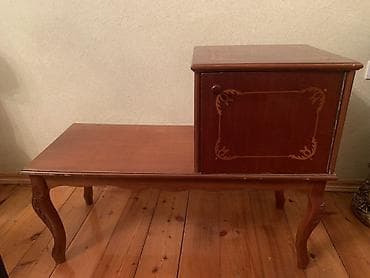 tumbucka: Telefon altlığı. Qədimi maldır — 1