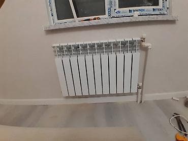 Xetlerin cekilmesi radiator ve konbi qurasdirilmasi.santexnik