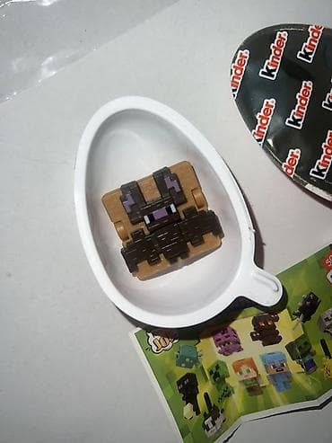 rubik kubu: Məhsul: Kinder Sürpriz – Minecraft kolleksiya fiquru Təsvir: - Kinder — 1