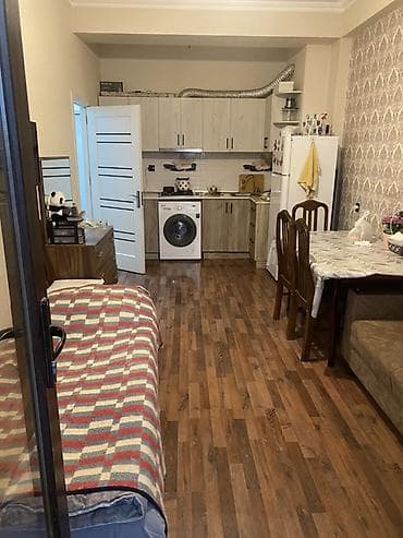xirdalanda ev: 1 otaqlı mənzil – studiya tipli zal + mətbəx, ayrıca yataq otağı və — 1