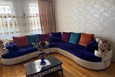 - L‑şəkilli geniş künc divanı - Korpus: ağ rəngli, yumru xətləri olan