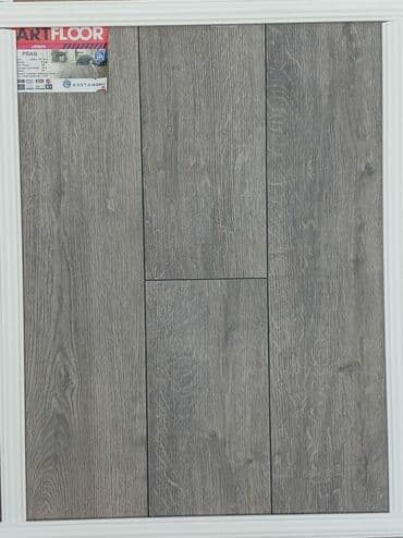 Laminat: Artfloor şirkətinin Prag modelindən olan boz rəngli laminat döşəməsi