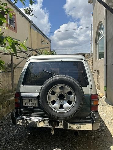 arxa panel: Mitsubishi Pajero: 2.8 l | 1995 il Ofrouder/SUV — 7