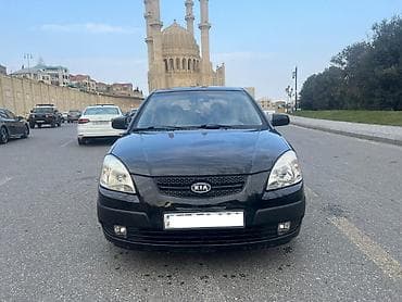 Kia Rio: 1.4 l | 2006 il Hetçbek — 1